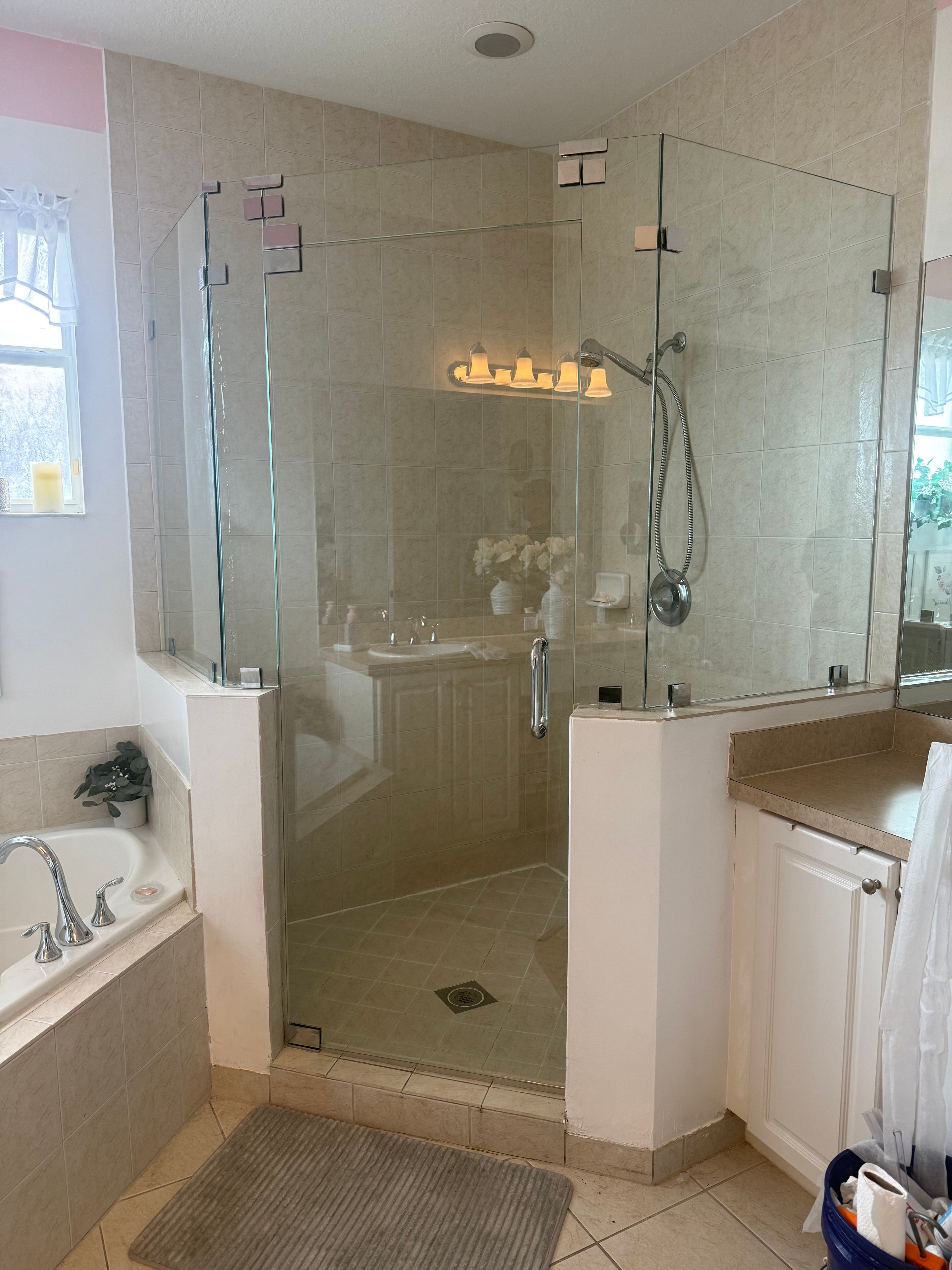 Frameless shower door installation with chrome hardware — Palm Beach Gardens, FL
