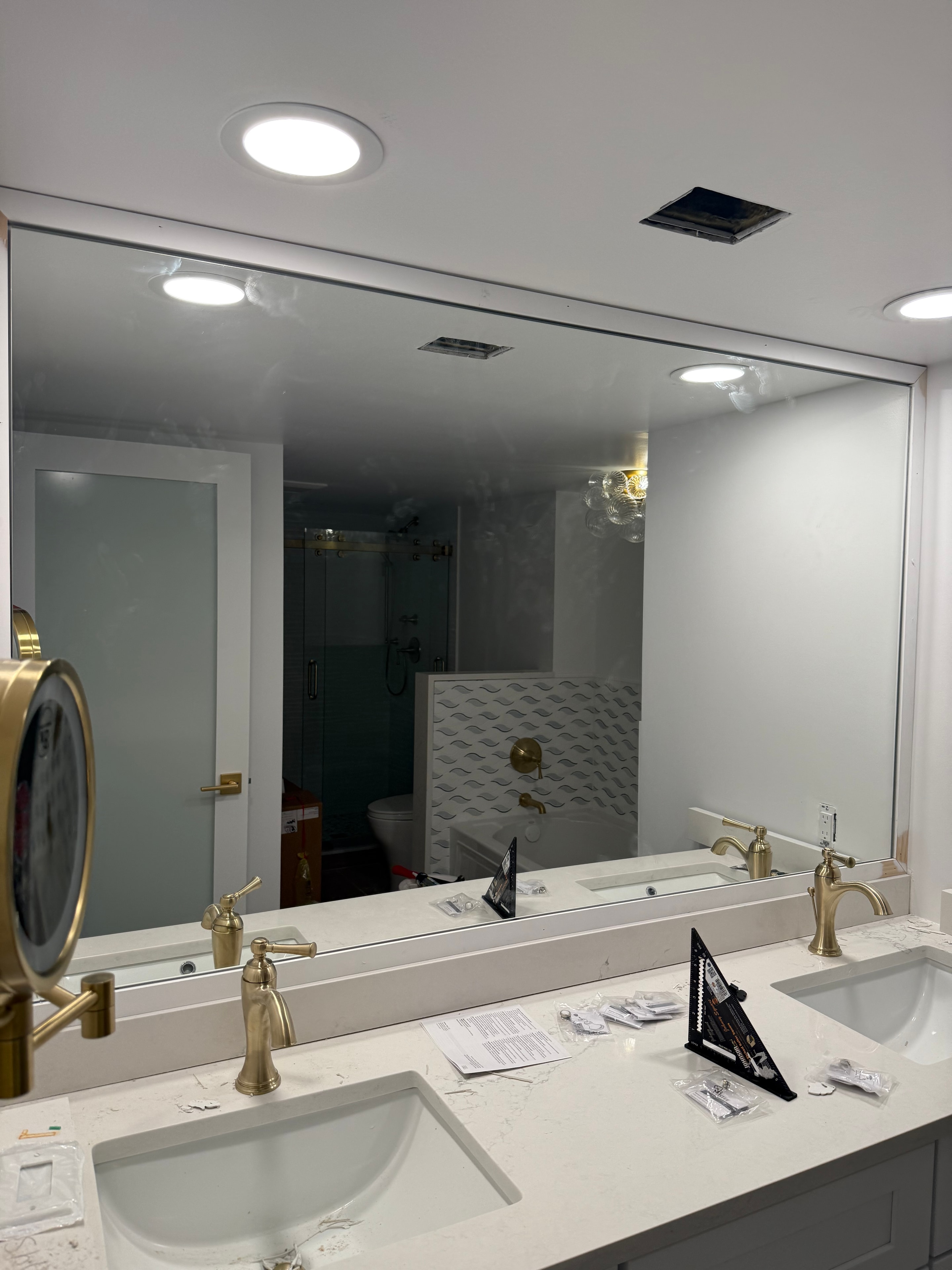 Frameless Mirror with Brass Fixtures — West Palm Beach, FL
