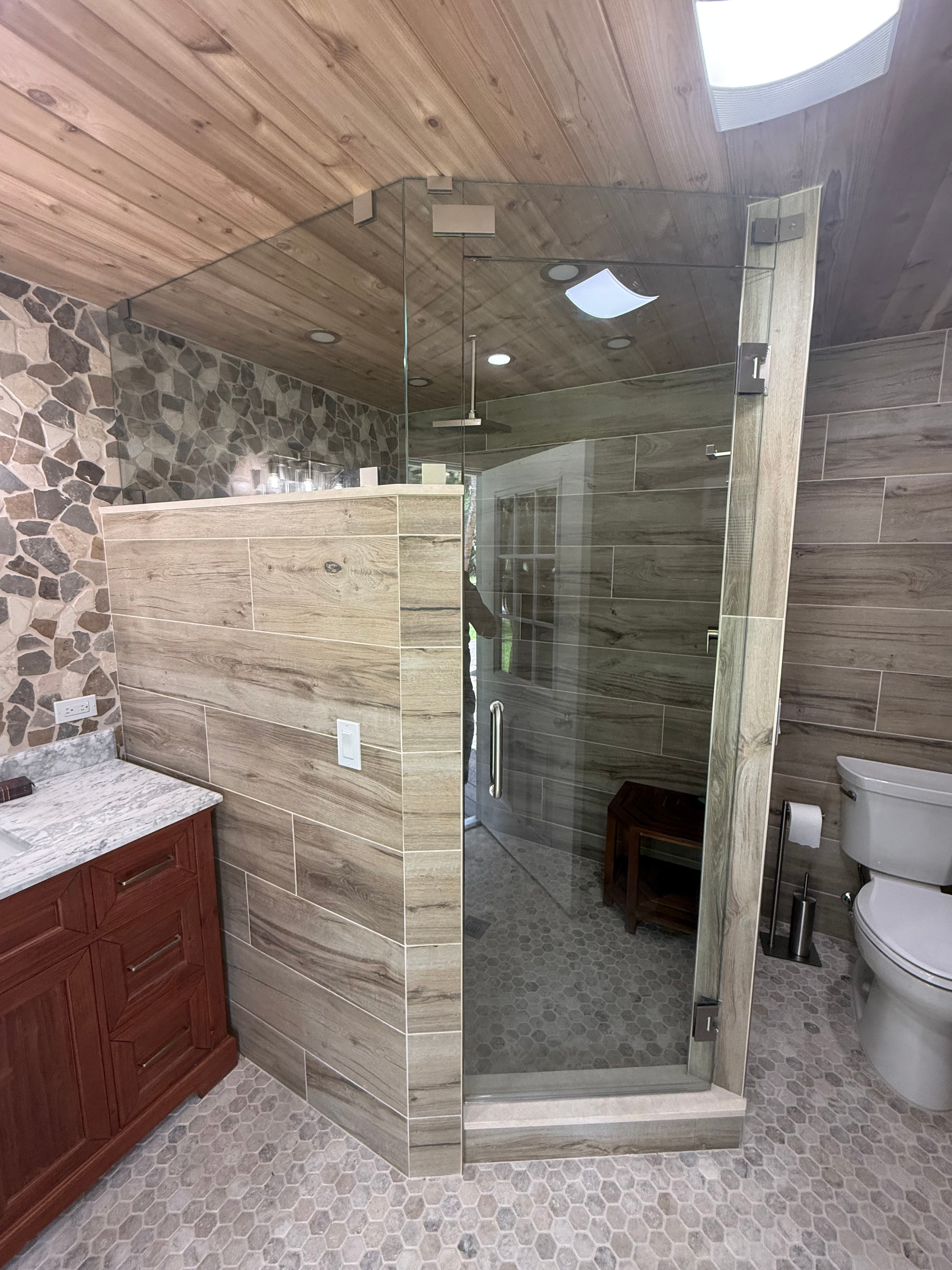 Clear Choice Glass Specialists team installing custom frameless shower glass — Palm Beach County, FL
